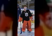 Oilers Hometown Remix Jersey: Black Gear Shows at Practice Oilers goalie Devon Levi in bright orange pads and black practice jersey at Rogers Place