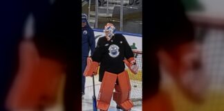 Oilers Hometown Remix Jersey: Black Gear Shows at Practice Oilers goalie Devon Levi in bright orange pads and black practice jersey at Rogers Place