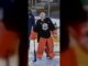 Oilers Hometown Remix Jersey: Black Gear Shows at Practice Oilers goalie Devon Levi in bright orange pads and black practice jersey at Rogers Place