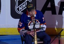 Dominick Critelli, 105, Plays Anthem at Islanders Home Opener 105-year-old World War II veteran Dominick Critelli plays the national anthem on saxophone before the Islanders home opener vs. Devils at UBS Arena