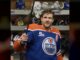 Oilers Crowbar Award: Draisaitl Adds New Postgame Prize Leon Draisaitl holds up the Oilers crowbar postgame award in the locker room after win over Wild