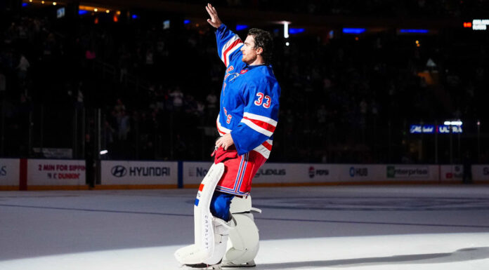 Rangers Home Start: 6-0 at MSG Behind Garand, Bjorkstrand Rangers goalie Dylan Garand waves to the Madison Square Garden crowd after beating the Ducks