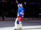 Rangers Home Start: 6-0 at MSG Behind Garand, Bjorkstrand Rangers goalie Dylan Garand waves to the Madison Square Garden crowd after beating the Ducks