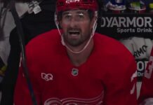Dylan Larkin Booed by Red Wings Fans, Then Cheered on Goal Dylan Larkin on the Detroit Red Wings bench after scoring in his season debut against the Ottawa Senators