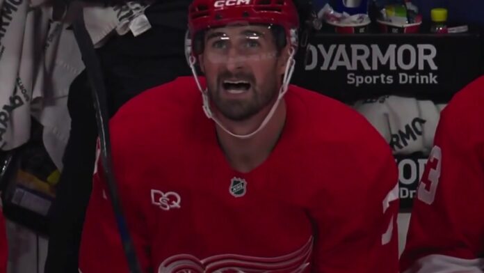 Dylan Larkin Red Wings bench season debut Dylan Larkin on the Detroit Red Wings bench after scoring in his season debut against the Ottawa Senators