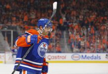 Evan Bouchard Record: Oilers D-Man Tops a 1917 Mark Edmonton Oilers defenseman Evan Bouchard celebrates a goal against the Vancouver Canucks at Rogers Place