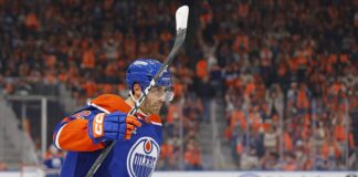 Evan Bouchard Record: Oilers D-Man Tops a 1917 Mark Edmonton Oilers defenseman Evan Bouchard celebrates a goal against the Vancouver Canucks at Rogers Place
