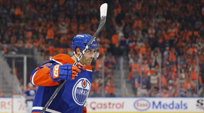 Evan Bouchard Record: Oilers D-Man Tops a 1917 Mark Edmonton Oilers defenseman Evan Bouchard celebrates a goal against the Vancouver Canucks at Rogers Place
