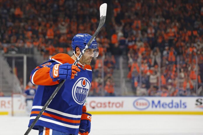 Evan Bouchard Oilers record eight points Edmonton Oilers defenseman Evan Bouchard celebrates a goal against the Vancouver Canucks at Rogers Place