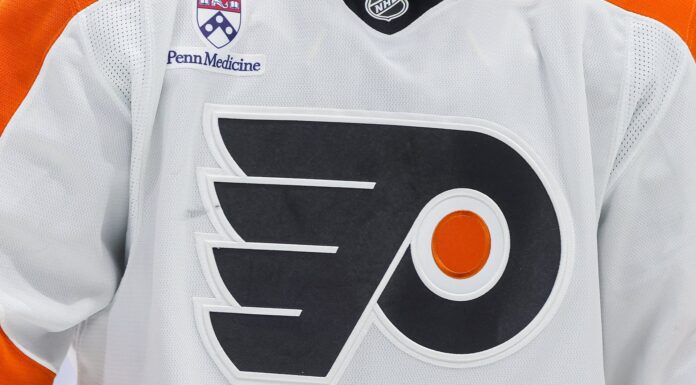 Nikita Grebenkin Injury: Flyers Winger Out Four Months Philadelphia Flyers white jersey logo as team announces Nikita Grebenkin back surgery