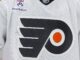 Nikita Grebenkin Injury: Flyers Winger Out Four Months Philadelphia Flyers white jersey logo as team announces Nikita Grebenkin back surgery