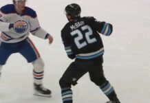 Trent Frederic Fights Jack McBain in Oilers-Mammoth Game Trent Frederic Oilers and Jack McBain Utah Mammoth fight on the ice