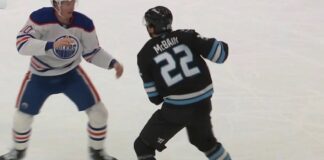 Trent Frederic Fights Jack McBain in Oilers-Mammoth Game Trent Frederic Oilers and Jack McBain Utah Mammoth fight on the ice