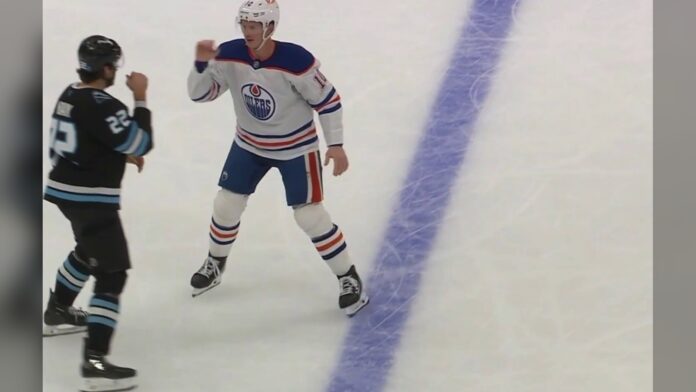 frederic-mcbain-fists-up-before-fight-oilers-mammoth Trent Frederic Oilers and Jack McBain Mammoth square up with fists raised before first period fight