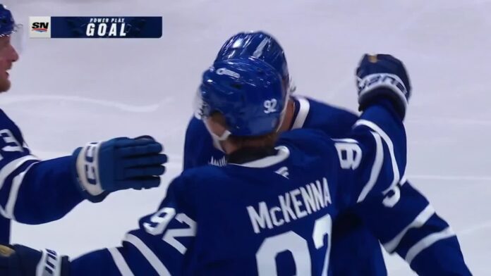Gavin McKenna Maple Leafs Sharks power play goal Gavin McKenna celebrates his power-play goal with Maple Leafs teammates against the Sharks