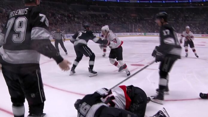 hayden-hodgson-hearing-brandt-clarke-down-on-ice-kings-senators Kings defenseman Brandt Clarke down on the ice after Hayden Hodgson boarding hit as Kings and Senators players scrum