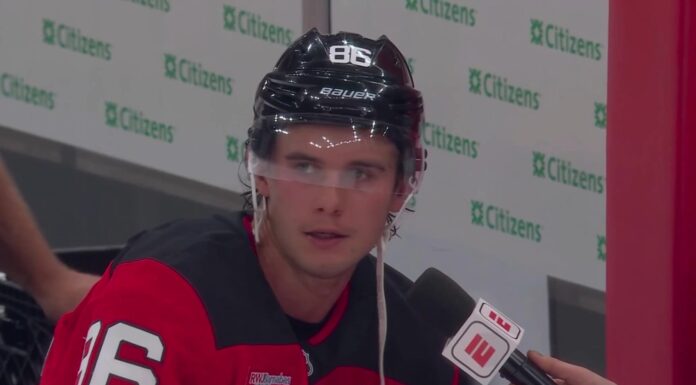 Jack Hughes Interview: Devils Star Shuts Down Bubble Wrap Joke Jack Hughes of the New Jersey Devils during an ESPN intermission interview at the Devils home opener against the Flyers