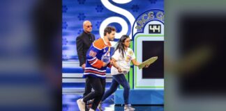 Walman, Schaefer, Wilson on Price Is Right Tonight Oilers defenseman Jake Walman in a No. 96 jersey on the set of The Price Is Right Tonight with host Howie Mandel