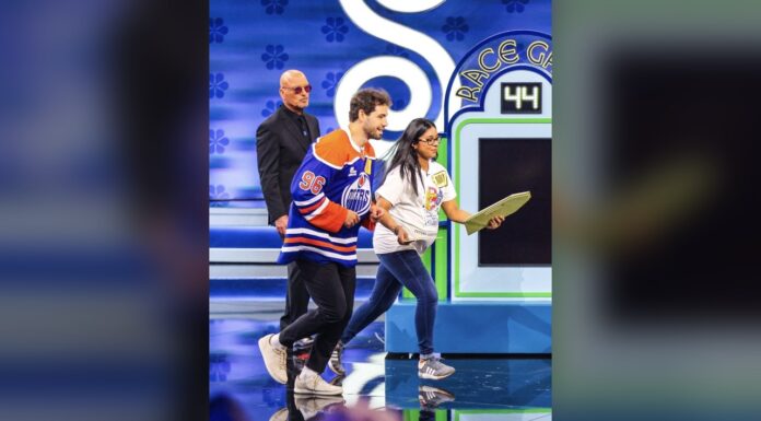 Walman, Schaefer, Wilson on Price Is Right Tonight Oilers defenseman Jake Walman in a No. 96 jersey on the set of The Price Is Right Tonight with host Howie Mandel