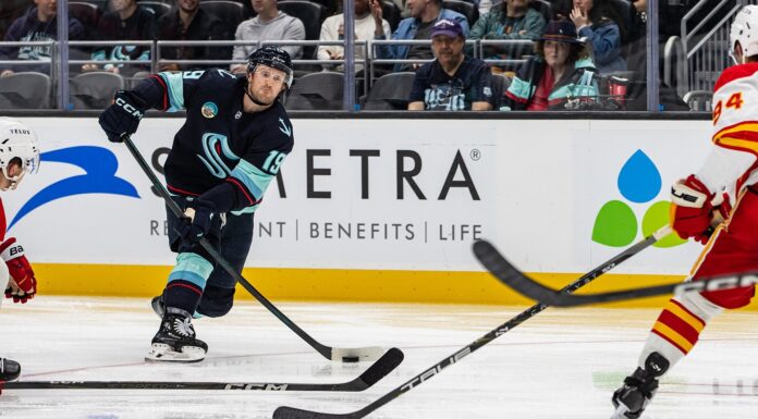 Jared McCann Injury: Kraken Forward Out 10 Weeks on IR Jared McCann Kraken forward shooting puck against Flames