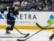 Jared McCann Injury: Kraken Forward Out 10 Weeks on IR Jared McCann Kraken forward shooting puck against Flames