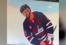 Josh Morrissey Injury: Jets Await Update After Missed Hit Winnipeg Jets defenseman Josh Morrissey holds his right hand after missing a hit and crashing into the boards against the Colorado Avalanche