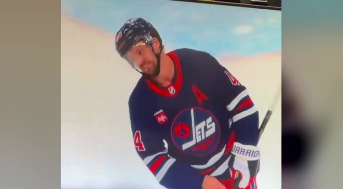 Josh Morrissey Injury: Jets Await Update After Missed Hit Winnipeg Jets defenseman Josh Morrissey holds his right hand after missing a hit and crashing into the boards against the Colorado Avalanche