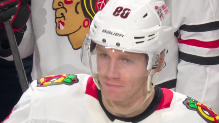 Patrick Kane Detroit ovation Red Wings tribute Patrick Kane in Blackhawks jersey reacts to standing ovation and video tribute in Detroit return