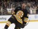 Marat Khusnutdinov celebrates a goal in a Bruins jersey