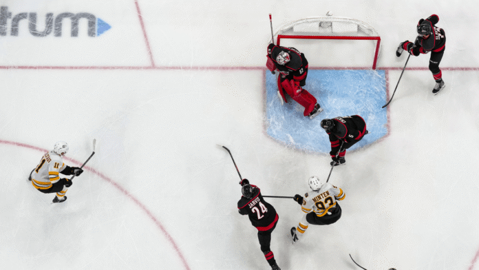 Kochetkov Hurricanes Bruins Hurricanes goalie Pyotr Kochetkov makes a save against the Bruins at Lenovo Center