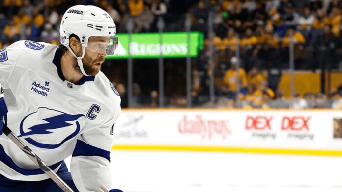 Lightning at Nashville Lightning captain in white road sweater skating in Nashville as Nikita Kucherov trade request lingers