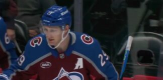 MacKinnon Four-Point Game: Avs Beat Lightning 6-3 Nathan MacKinnon of the Colorado Avalanche celebrates at the bench after a goal against the Tampa Bay Lightning