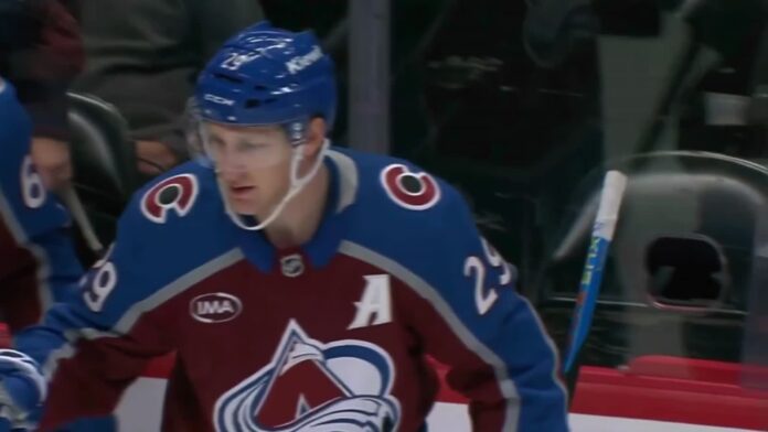 mackinnon-celebrates-avalanche-lightning-oct-23 Nathan MacKinnon of the Colorado Avalanche celebrates at the bench after a goal against the Tampa Bay Lightning