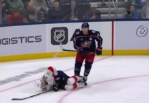 Mathieu Olivier Ejection: Slash on Balinskis Draws Major Blue Jackets forward Mathieu Olivier stands over Panthers defenseman Uvis Balinskis after slashing penalty