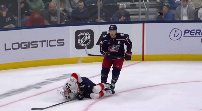 Mathieu Olivier Ejection: Slash on Balinskis Draws Major Blue Jackets forward Mathieu Olivier stands over Panthers defenseman Uvis Balinskis after slashing penalty
