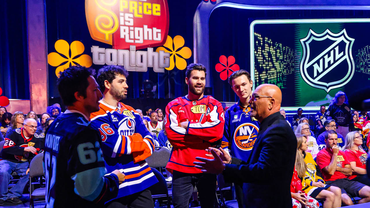 Tom Wilson, Matthew Schaefer, Jake Walman and Brandon Montour with host Howie Mandel on the set of The Price Is Right Tonight