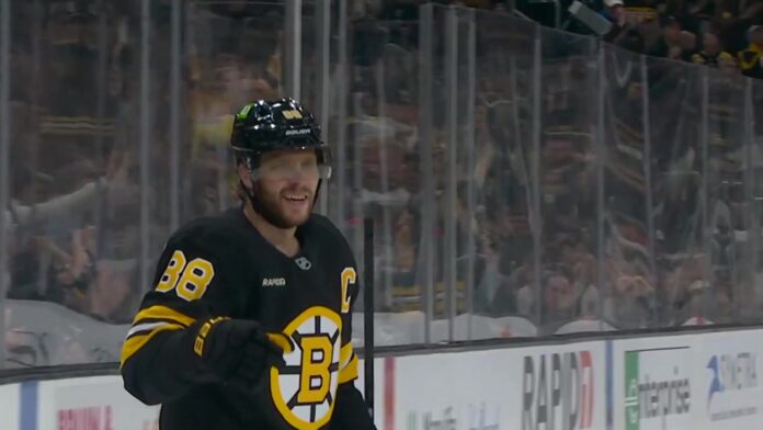 David Pastrnak Bruins captain celebrates power-play goal against Utah Mammoth at TD Garden