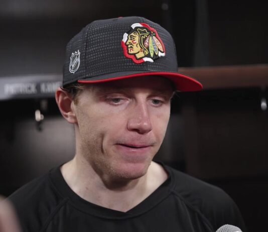 Patrick Kane speaks to reporters in the Chicago Blackhawks locker room after his United Center homecoming win over the St. Louis Blues