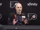 Flyers head coach Rick Tocchet speaking at a postgame press conference about defensemen and scooter skating