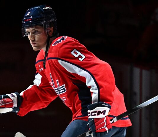 Washington Capitals forward Ryan Leonard in the home red sweater