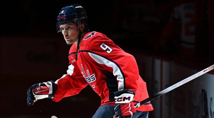 Ryan Leonard Goal: End-to-End Rush Sparks Capitals Over Devils Washington Capitals forward Ryan Leonard in the home red sweater