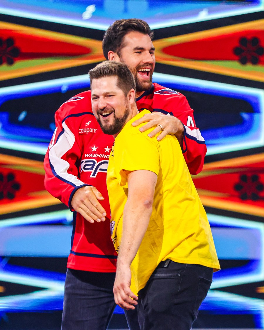 Capitals forward Tom Wilson hugs a contestant on The Price Is Right Tonight set