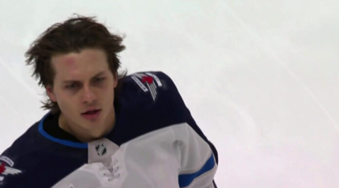 Tyrel Bauer Fight: Jets Rookie Drops Keegan Kolesar Winnipeg Jets defenseman Tyrel Bauer after his fight with Keegan Kolesar against the Detroit Red Wings