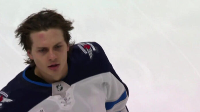 Tyrel Bauer Jets fight Kolesar Winnipeg Jets defenseman Tyrel Bauer after his fight with Keegan Kolesar against the Detroit Red Wings