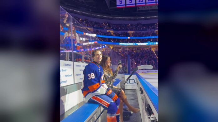 Victor Eklund Islanders birthday first NHL goal Victor Eklund of the New York Islanders smiles on the bench as UBS Arena fans sing Happy Birthday after his first NHL goal