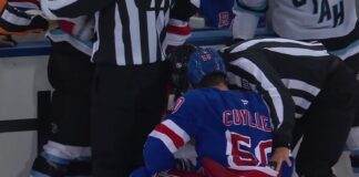 Will Cuylle Hit on Dylan Guenther Sparks Fight With McBain Rangers forward Will Cuylle (50) held by linesmen after his hit from behind on Mammoth forward Dylan Guenther at Madison Square Garden