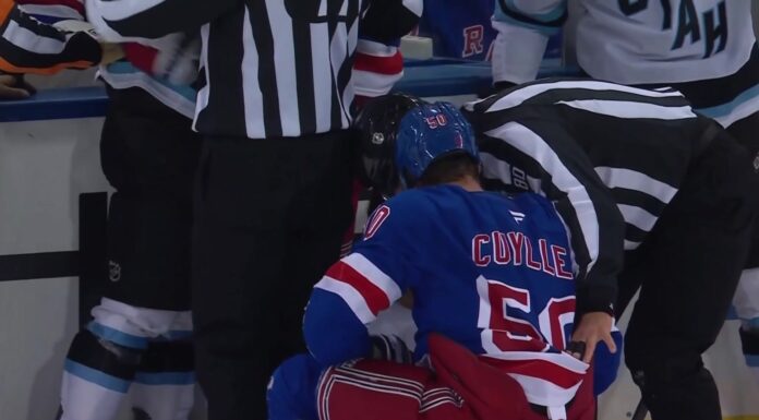 Will Cuylle Hit on Dylan Guenther Sparks Fight With McBain Rangers forward Will Cuylle (50) held by linesmen after his hit from behind on Mammoth forward Dylan Guenther at Madison Square Garden