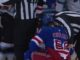 Will Cuylle Hit on Dylan Guenther Sparks Fight With McBain Rangers forward Will Cuylle (50) held by linesmen after his hit from behind on Mammoth forward Dylan Guenther at Madison Square Garden